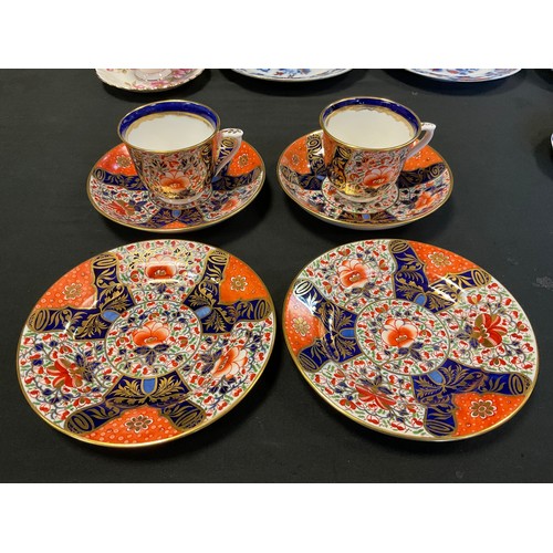 80A - Ceramics -  a pair of late 19th century Sampson Hancock Derby trios, painted in the Imari pallet, pa... 