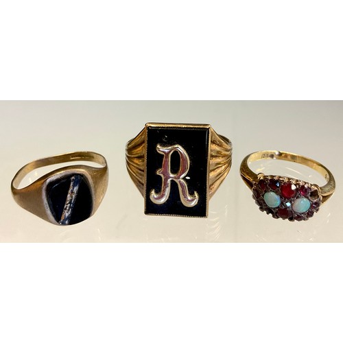 455 - A 9ct gold signet ring, Letter R on black ground; another smaller 7.6g gross,  18ct gold opal and ru... 