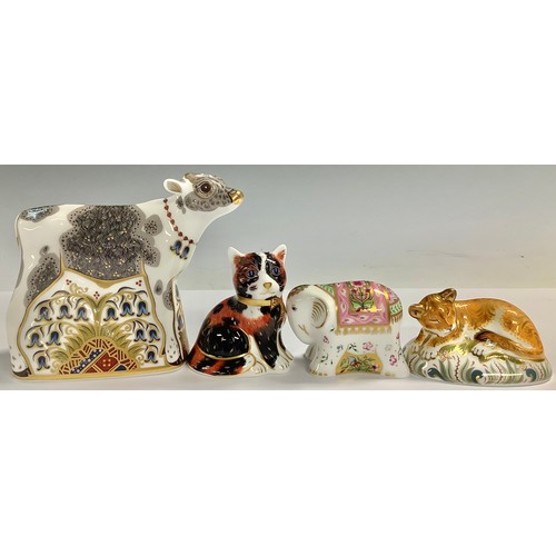 17 - A Royal Crown Derby paperweight, Rupa Baby Girl Indian Elephant, gold stopper; three others, Bluebel... 