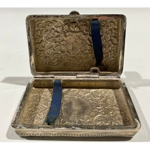 62 - An Indian silver rectangular cigarette case, 8cm long, 92g gross