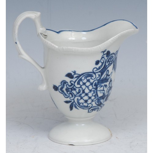 74 - A Christian Liverpool silver shaped milk jug,   painted in underglaze blue with Mother & Child and M... 