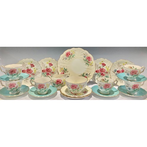 77 - An Aynsley tea service for six, printed with poppies and other flowers, comprising cake plate, side ... 