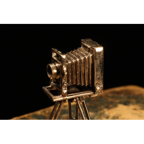 89 - An Elizabeth II silver novelty toy miniature model, of a Victorian plate camera on tripod, 9cm high,... 