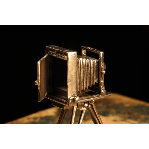 89 - An Elizabeth II silver novelty toy miniature model, of a Victorian plate camera on tripod, 9cm high,... 