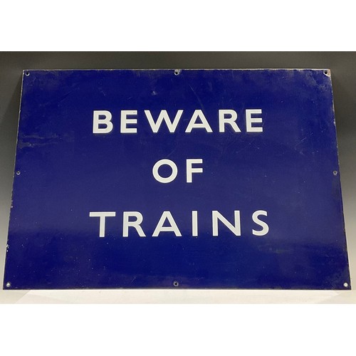 131 - A rectangular blue enamel railway sign, Beware of Trains, mid 20th century, 48.5cm x 68.5cm