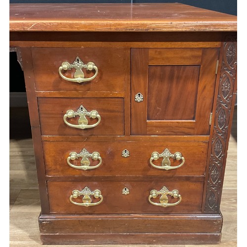 102 - A large Arts and Crafts mahogany partners’ desk, rectangular top above an arrangement of drawers, sl... 