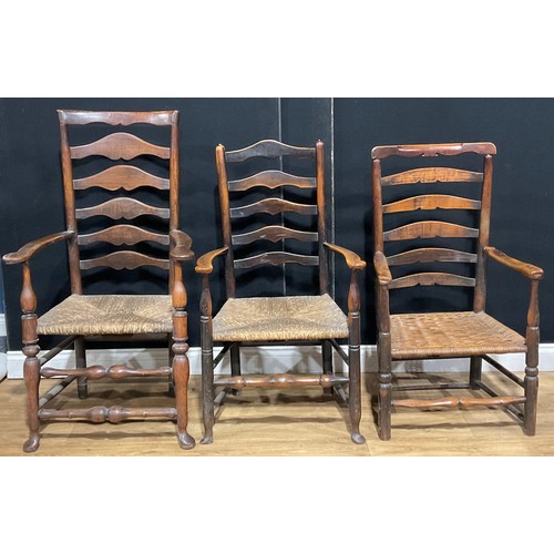 105 - A harlequin collection of 19th century West Midlands and Lancashire ladderback chairs (9)