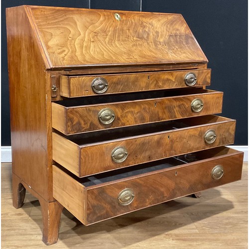 106 - A Regency mahogany bureau, fall front enclosing a writing surface, small drawers, pigeonholes and se... 