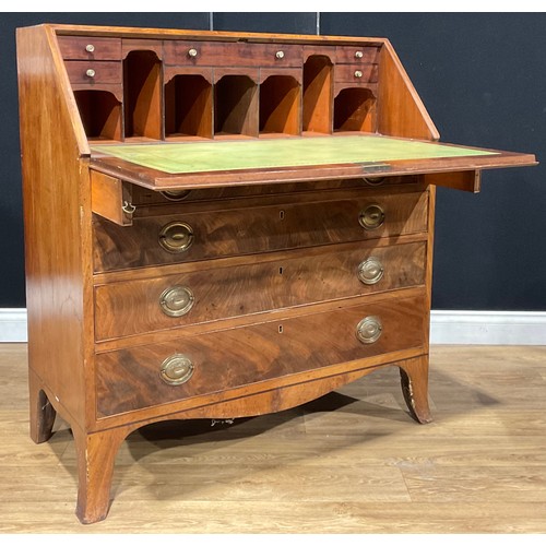 106 - A Regency mahogany bureau, fall front enclosing a writing surface, small drawers, pigeonholes and se... 