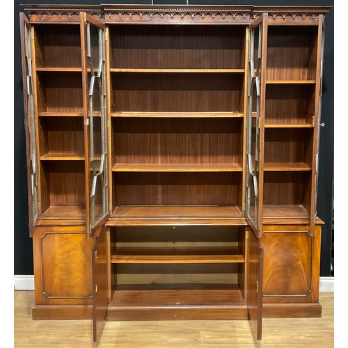 120 - A Reprodux George III style break-centre library bookcase, 214.5cm high, 204.5cm wide, 39.5cm deep