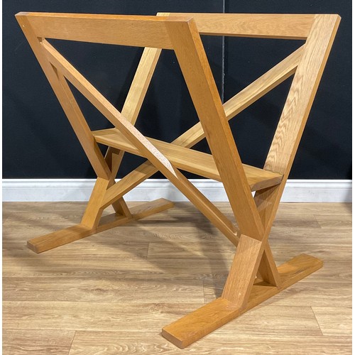 415 - An oak folio stand, 96cm wide, 77cm deep