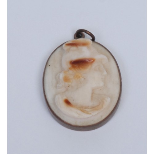 687 - A 19th century Grand Tour shell cameo pendant, carved with a bust length portrait of the goddess Rom... 