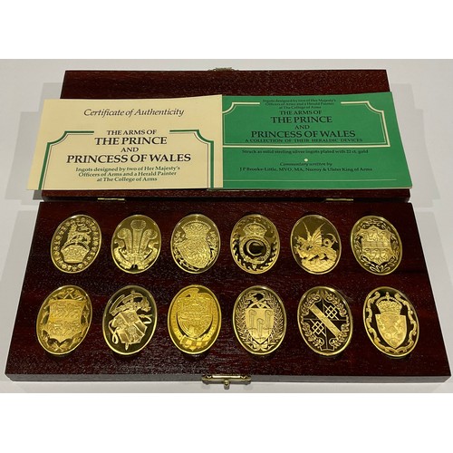 730 - A set of 12 oval silver gilt plaques or ingots for the arms of the Prince and Princess of Whales, pr... 