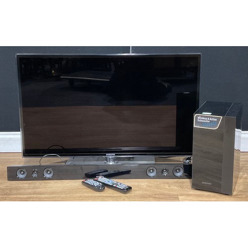 738 - A Samsung UE40D6530 television; a Samsung HW-E450 sound bar; a Samsung PS-WE450 Wireless & Active Su... 