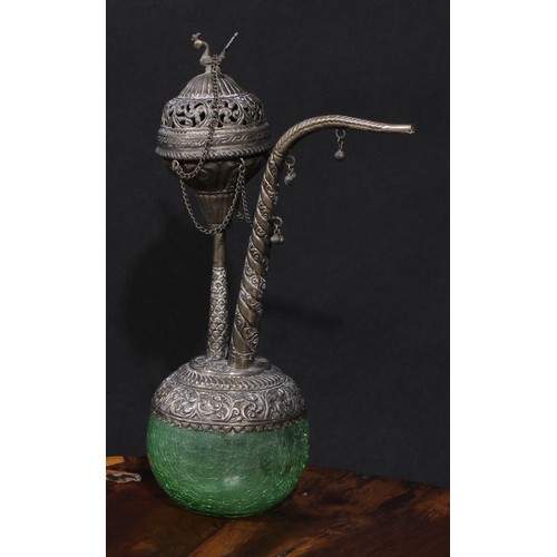 740 - An Indian silver coloured metal hookah, pierced and chased with leafy scrolls and lotus, the cover w... 