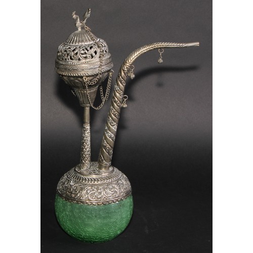 740 - An Indian silver coloured metal hookah, pierced and chased with leafy scrolls and lotus, the cover w... 