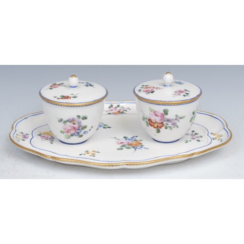 741 - A Sevres double plateau a deux pots de confitures, painted with colourful flowers under blue line bo... 