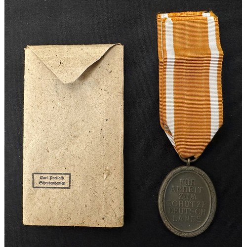 2038 - WW2 Third Reich Deutsches Schutzwall-Ehrenzeichen - West Wall Medal. Complete with ribbon and in mak... 