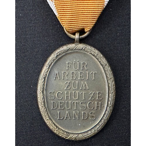 2038 - WW2 Third Reich Deutsches Schutzwall-Ehrenzeichen - West Wall Medal. Complete with ribbon and in mak... 