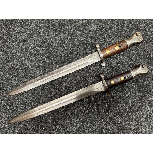 2049 - Boer War Lee Metford Bayonets x 2. Both without scabbards. Double edged blades 
approx. 300mm in len... 