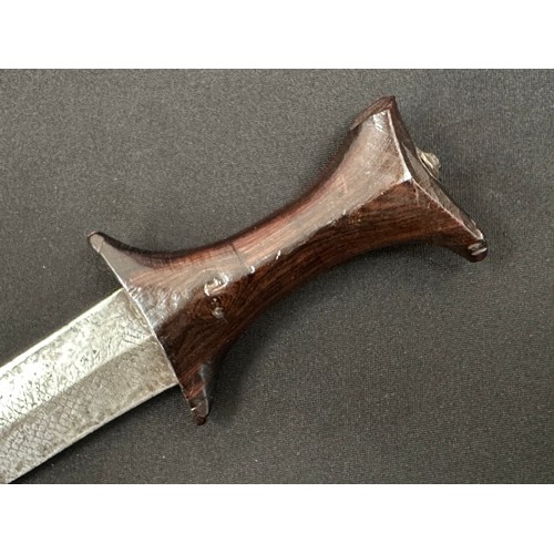 2057 - African Dagger with double edged blade 87 mm in length. Geometric pattern decoration to the blade. W... 