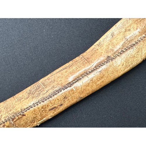 2058 - Dagger with curved double edged fullered blade 314mm in length. Decorative grip made from brass, cop... 