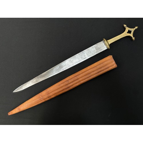 2060 - Dagger with double edged blade with punch mark decoration, 364mm in length. Cast brass grip. Overall... 