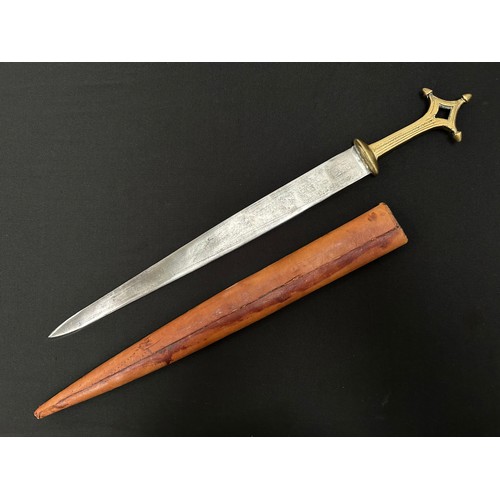 2060 - Dagger with double edged blade with punch mark decoration, 364mm in length. Cast brass grip. Overall... 