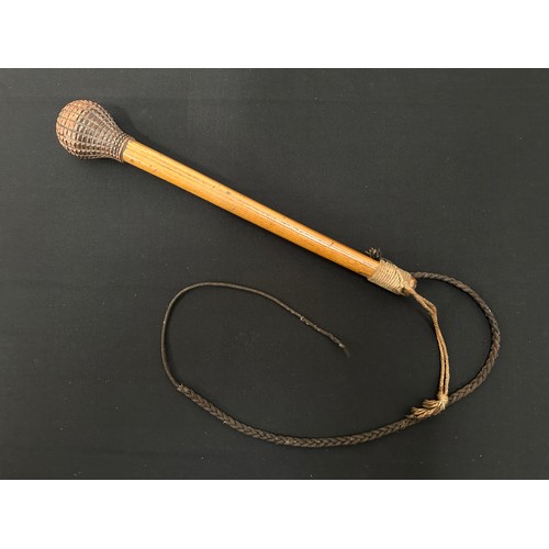 2071 - Bosuns Persuader. Carved wooden pommel. Overall length 305mm. Hanging cord along with plaited strap.