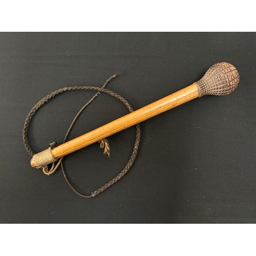 2071 - Bosuns Persuader. Carved wooden pommel. Overall length 305mm. Hanging cord along with plaited strap.