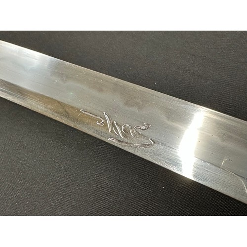 2083 - Japanese Katana Sword with single edged blade 715mm in length with good Hamon line to the cutting ed... 