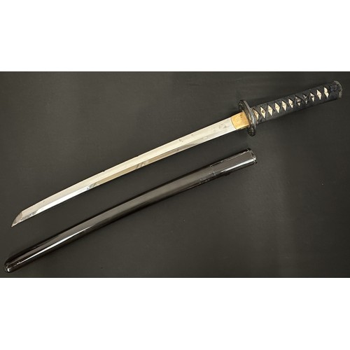 2088 - Japanese Wakizashi Sword with single edged blade 540mm in length. Hamon line to cutting edge. Some c... 