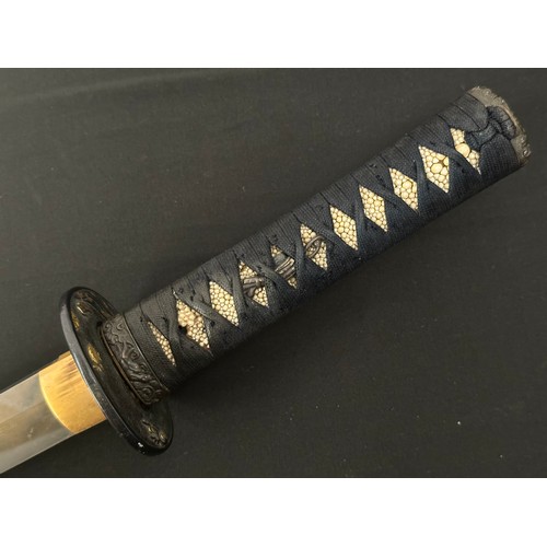 2088 - Japanese Wakizashi Sword with single edged blade 540mm in length. Hamon line to cutting edge. Some c... 