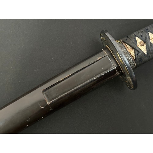 2088 - Japanese Wakizashi Sword with single edged blade 540mm in length. Hamon line to cutting edge. Some c... 