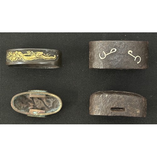 2095 - A collection of Japanese Sword fittings.