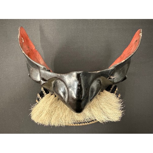 2096 - Japanese Samurai Menpo or Me no shita Facial Armour. Black laquered finish with gilt decoration and ... 