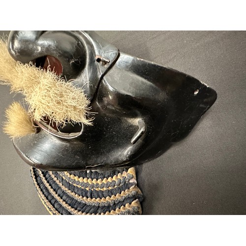 2096 - Japanese Samurai Menpo or Me no shita Facial Armour. Black laquered finish with gilt decoration and ... 