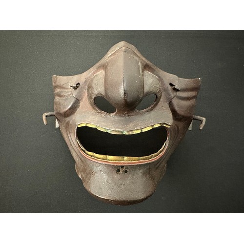 2098 - Japanese Samurai Menpo facial or Me no shita ho armour with brown lacquer finish with teeth picked o... 