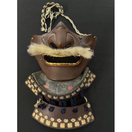 2099 - Japanese Samurai Menpo or Me no shita ho facial armour with brown lacquer finish and bristle moustac... 