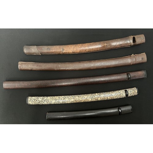 2102 - A collection of three Japanese Sword Saya Scabbards including one with Ray Skin wrap, along with two... 