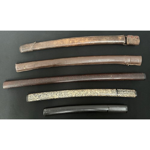 2102 - A collection of three Japanese Sword Saya Scabbards including one with Ray Skin wrap, along with two... 