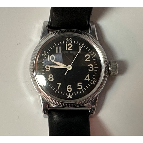 2184 - WW2 AFUS Army Type A-11 Issue Wristwatch with black dial with Arabic numerals. Reverse of case is fu... 