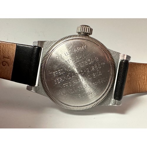 2184 - WW2 AFUS Army Type A-11 Issue Wristwatch with black dial with Arabic numerals. Reverse of case is fu... 