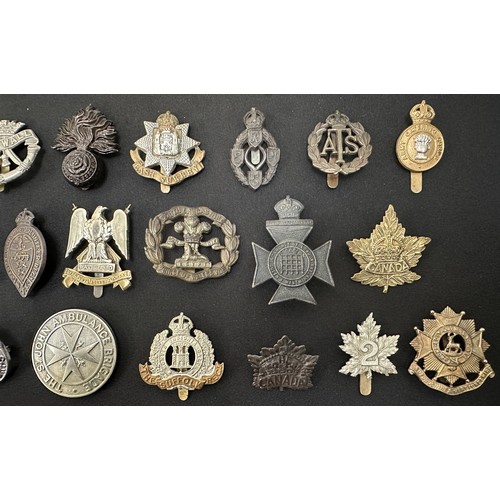 2200 - WW2 British Cap badge collection of approx 100 badges. WW2 and some post war ERII Staybrite examples... 