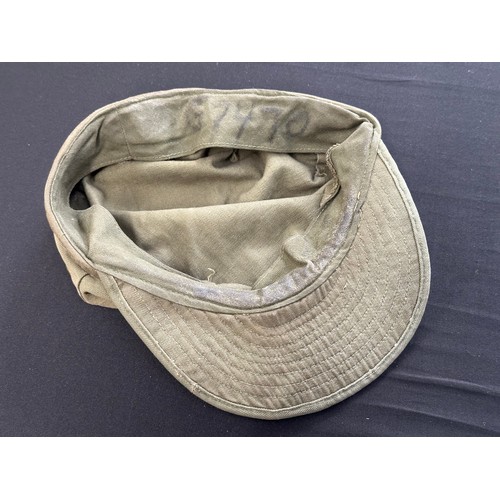 2216 - WW2 US Army HBT Fatigue Cap. Second pattern cap with the longer peak. Has original owners number 