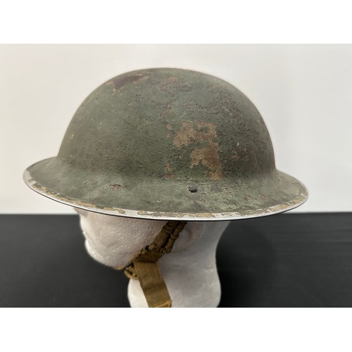 2228 - WW2 British MKII Steel Helmet, over painted dark green over the brown finish. Once had a decal. Comp... 