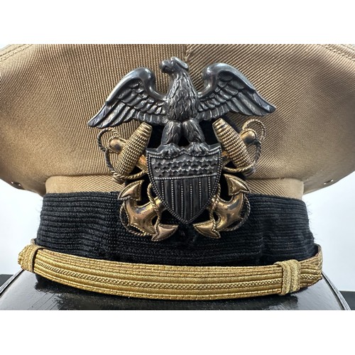 2238 - WW2 US Navy officers visor cap. Complete with cap badge. Maker marked 