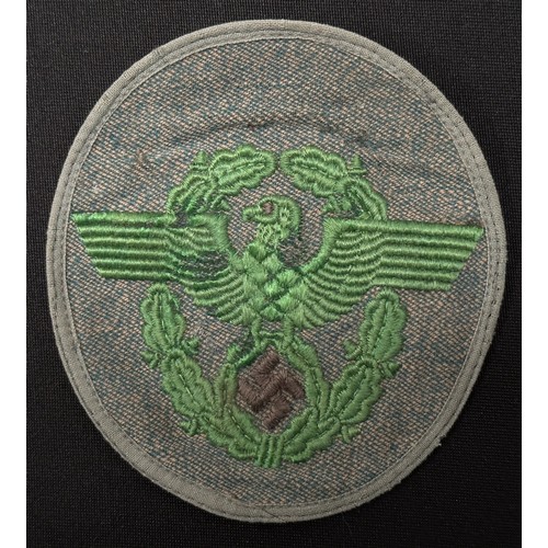 2253 - WW2 Third Reich Police Sleeve Eagle group. Two are uniform removed while the third appears unissued.... 