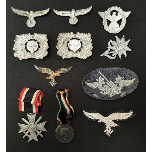 2254 - WW2 Third Reich uniform removed insignia to include: Pair of Zoll cap eagle plus wreath and cockades... 