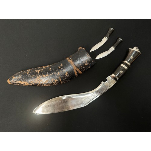 2286 - Kukri Knife with plated single edged blade wth some punch mark decoration, 300mm in length. Horn gri... 